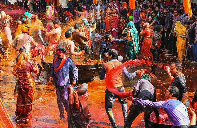 People celebrate Kodamar Holi in Beawar, Wednesday, 11 March 2020.