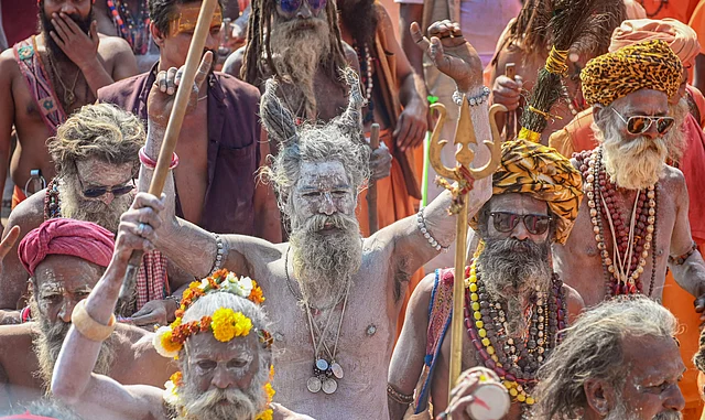Naga sadhus participate in a procession during the Narmada Gau Kumbh 2020, in Jabalpur, Tuesday, 3 March, 2020.