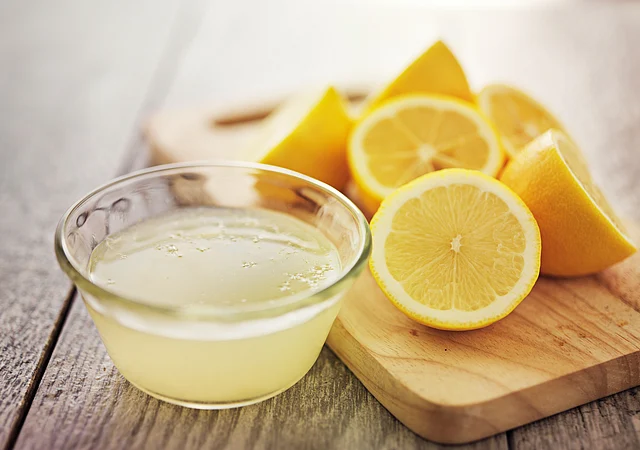 Add the juice of lemon to finely minced garlic.