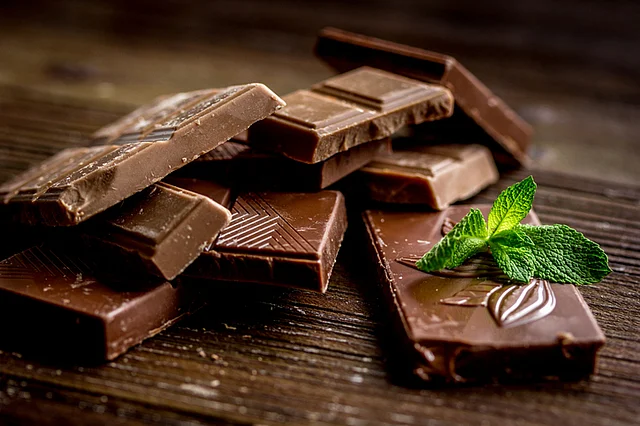 Try to stick to about 100 calories of dark chocolate daily, adjusting your calorie intake and exercise appropriately.