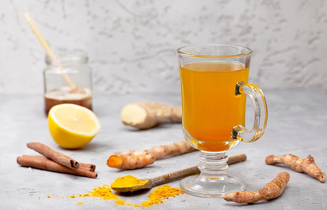 Boil 2 cups of water and add a tablespoon of grated ginger and 1/2 a teaspoon of turmeric powder.