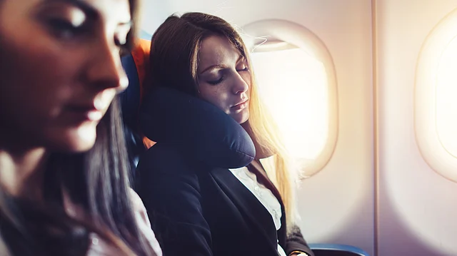 Earplugs, travel pillow, water bottle, and medicines!