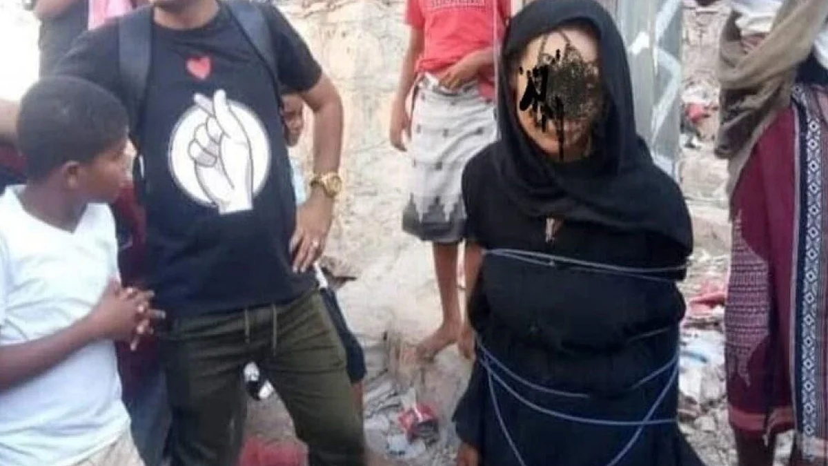 مشهد لامرأة مربوطة في عمود بشارع عام يثير ضجة واسعة في اليمن