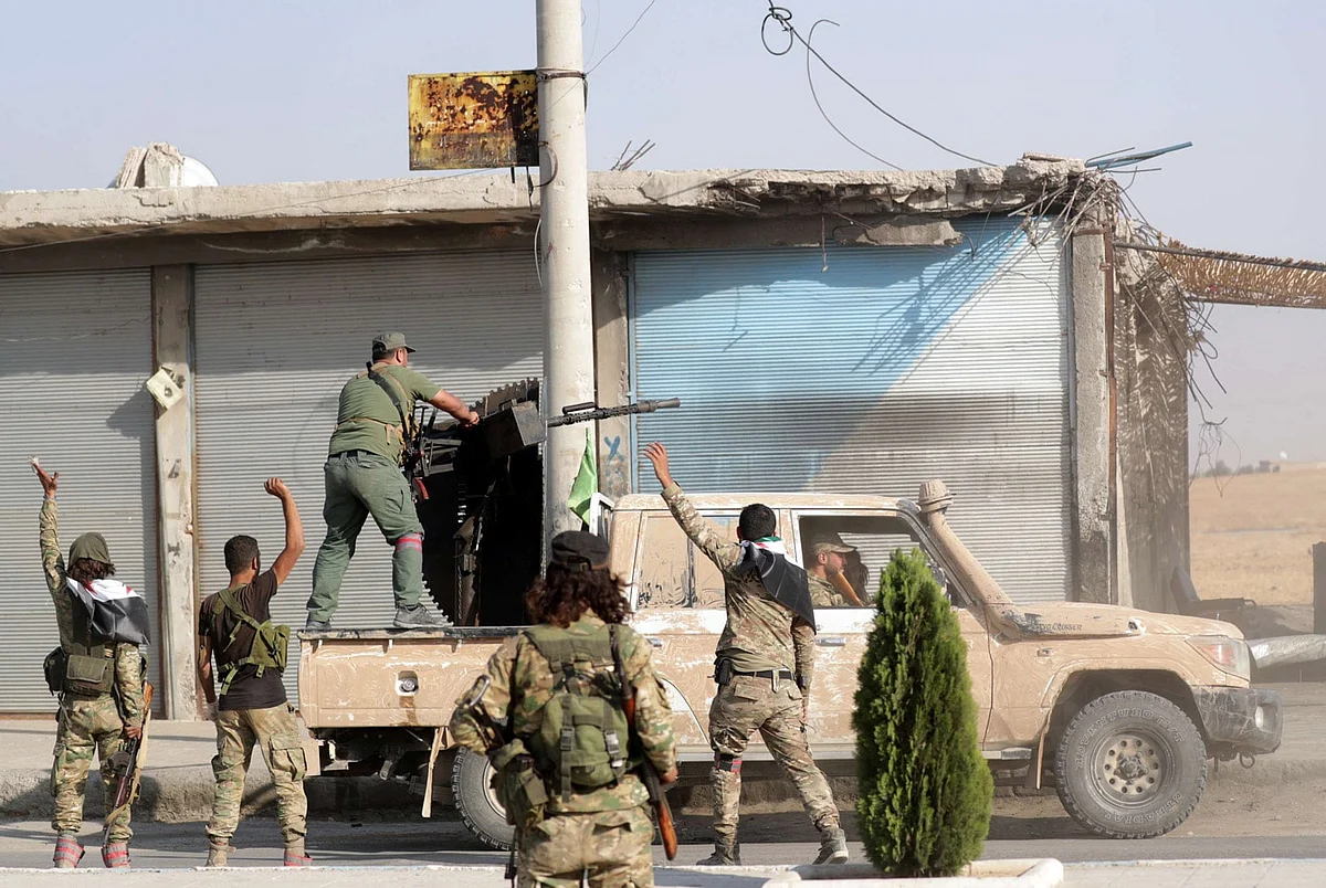 Turkey agrees with US to pause all military operations in northern Syria