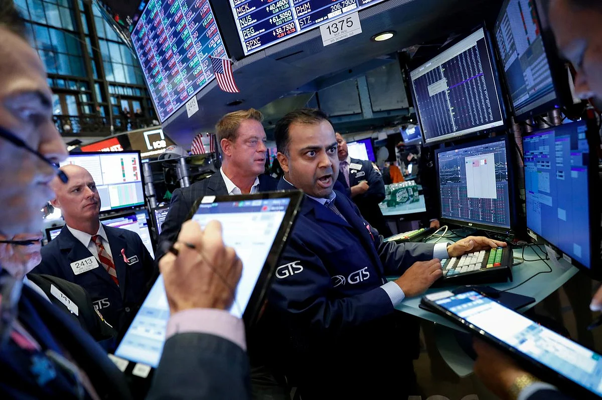 Wall Street dips as investors await US-China trade progress
