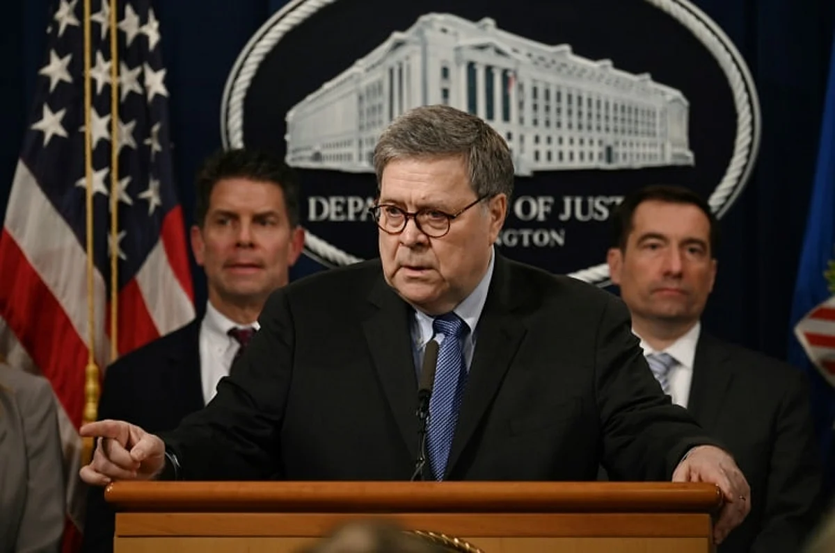 U.S. Attorney General William Barr announces the findings of the criminal investigation into the Dec. 6, 2019, shootings at the Pensacola Naval Air Station in Florida during a news conference at the Justice Department in Washington, U.S.