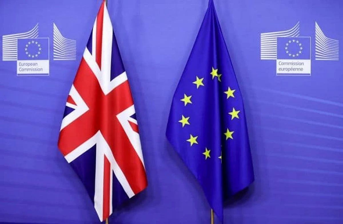 FILE PHOTO: Flags of the Union Jack and European Union are seen ahead of the meeting of European Commission President Ursula von der Leyen and British Prime Minister Boris Johnson, in Brussels, Belgium December 9, 2020. Olivier Hoslet/Pool via REUTERS