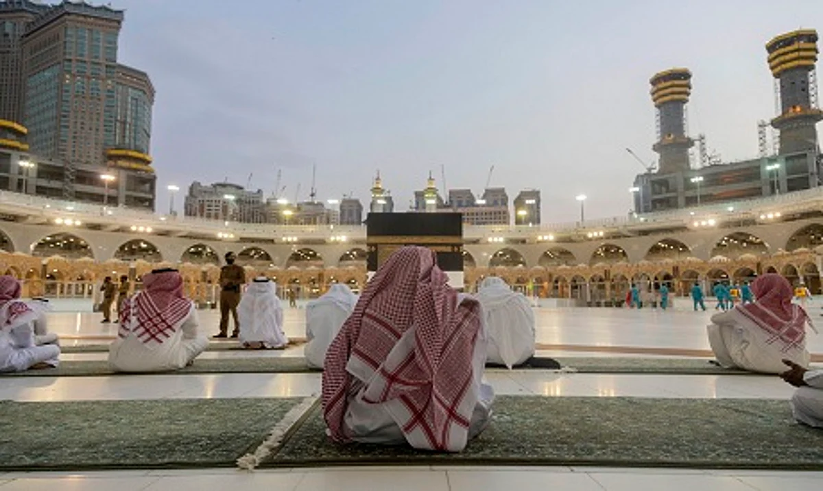 Pilgrims pray around the Kaaba.