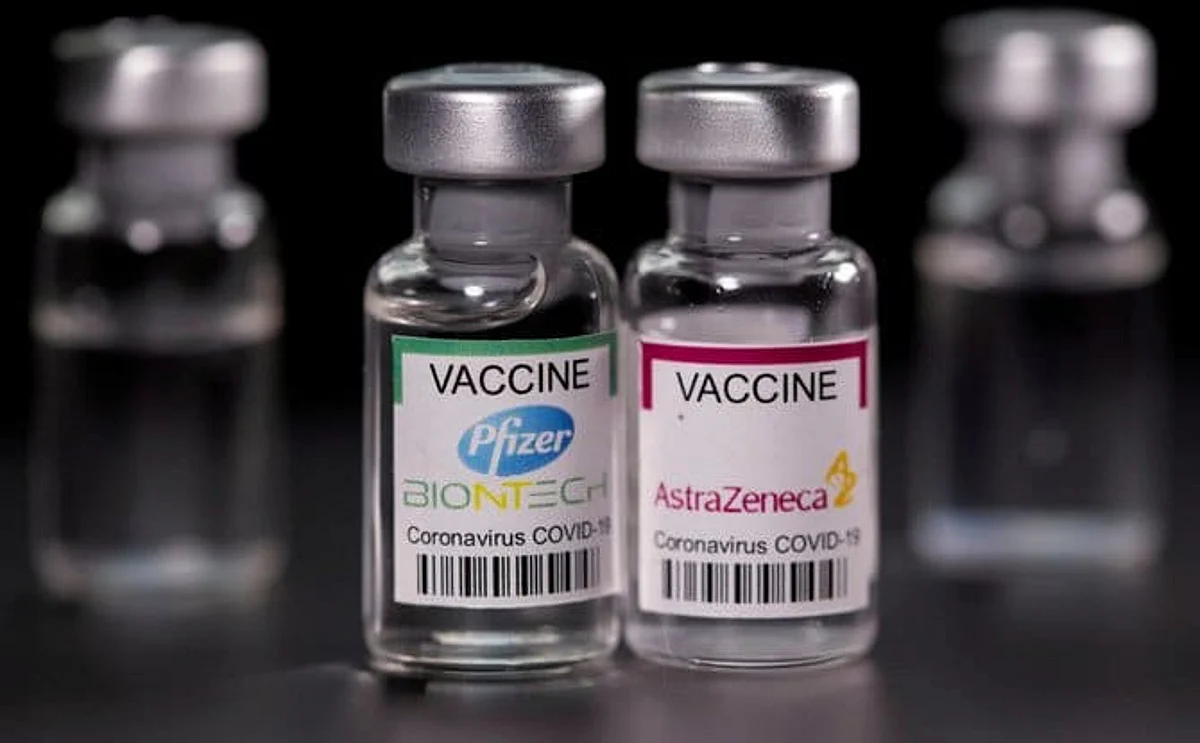 Vials with Pfizer-BioNTech and AstraZeneca COVID-19 vaccine labels are seen in this illustration picture. (REUTERS/File)