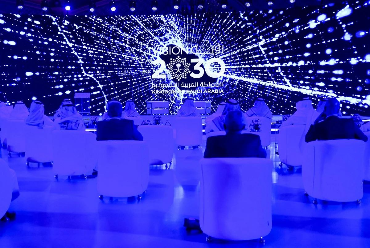 Guests attend the Global AI 2020 (Artificial Intelligence) Summit in the Saudi capital Riyadh on October 21, 2020. - The summit, organized by the Saudi Data & AI Authority (SDAIA) and G20 Saudi Secretariat as part of The International Conferences Program, brings together stakeholders from public sector, academia and private sector, including technology companies, investors, entrepreneurs and startups to shape the future of Artificial Intelligence (AI). (Photo by FAYEZ NURELDINE / AFP) (Photo by FAYEZ NURELDINE/AFP via Getty Images)