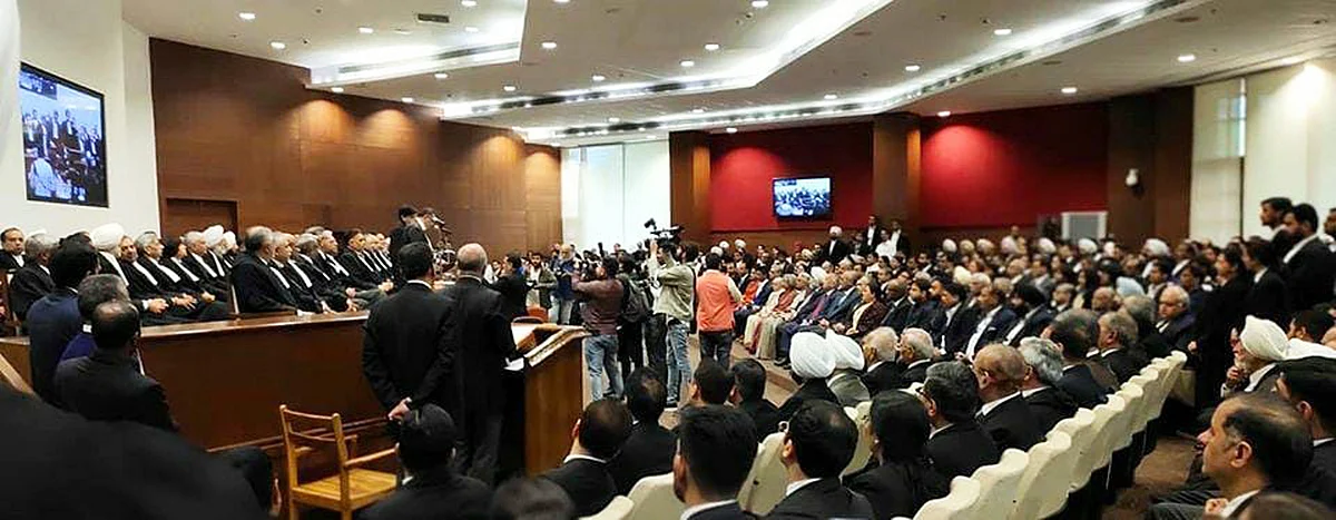“The feet of the people, behind the heads of the judges”: A case for banishment of the pedestal