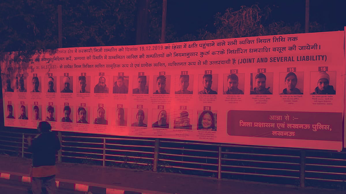 Banners displaying photographs of accused persons