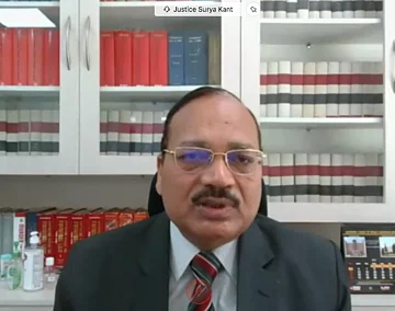 Justice Surya Kant, speaking during the webinar