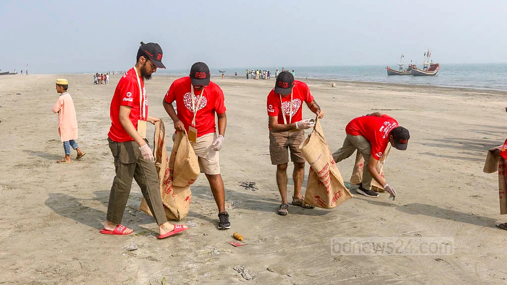 Volunteers from different backgrounds join the cleanliness drive as part of the International Coastal Cleanup campaign at St Martin's Island on Friday, Dec 16, 2022.