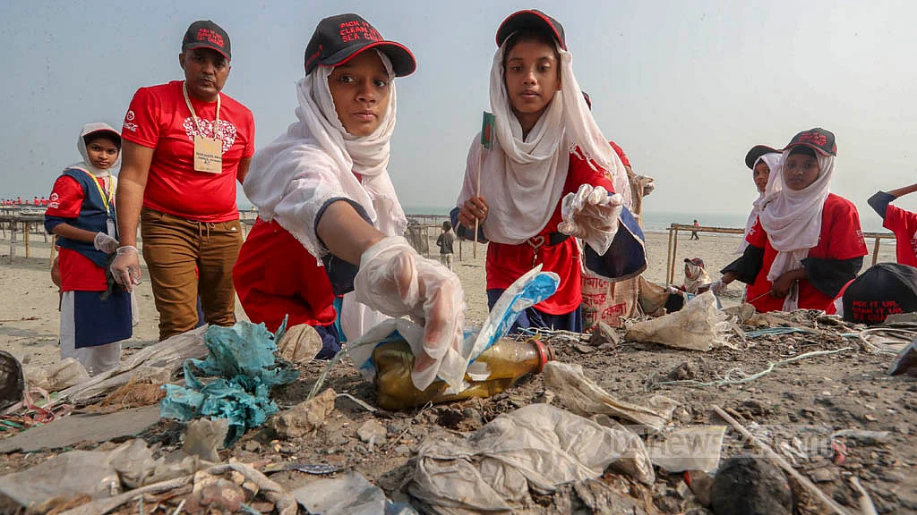 Volunteers conduct a cleanliness drive at St Martin’s Island, Bangladesh’s only coral island, on Friday, Dec 16, 2022.