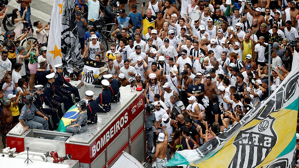 Huge crowds bid football star Pele farewell in Santos