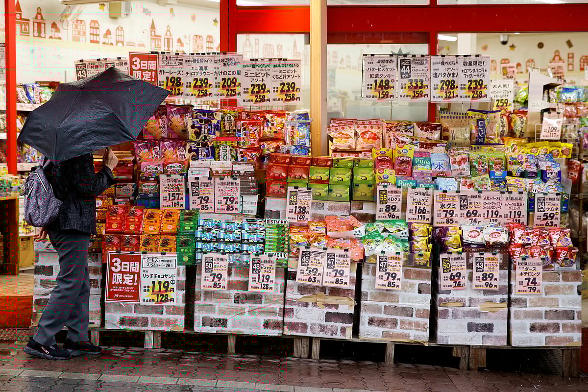 A woman looks at items at a shop in Tokyo, Japan, March 24, 2023. 
