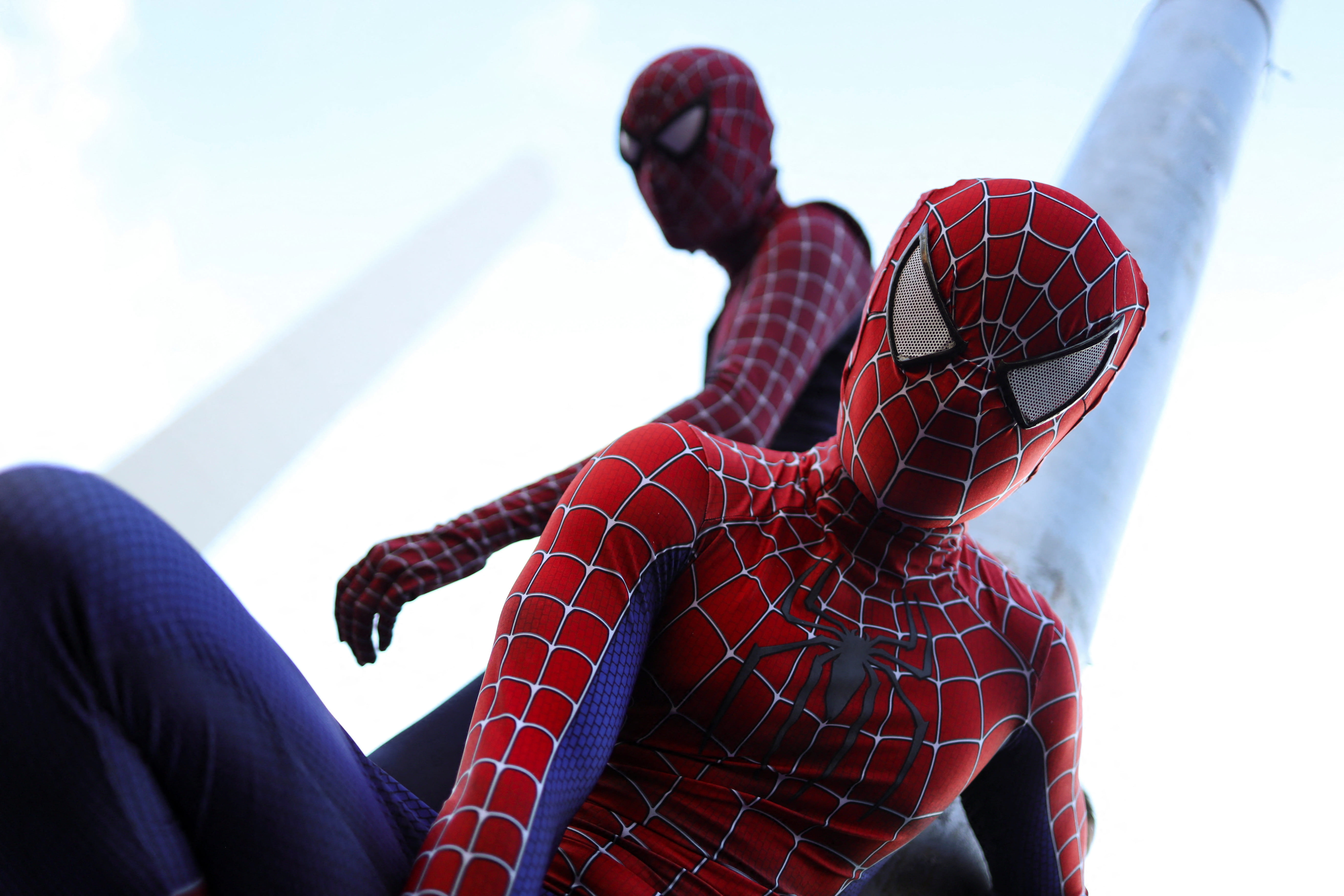 Two men dressed as Spider-Man pose for a picture at a Spider-Man cosplayers' gathering, organised in an attempt to set a Guinness World Record for the largest gathering of people dressed as Spider-Man, in Buenos Aires, Argentina October 29, 2023.