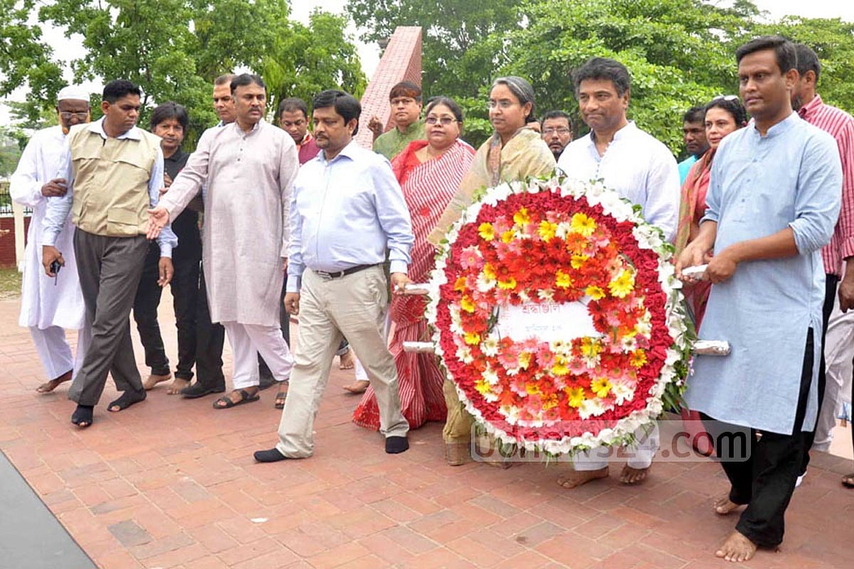 Ahead of hitting the campaign trail, flanked by Awami League leaders, he placed a wreath at the Martyrs Intellectuals Memorial in Mirpur.​