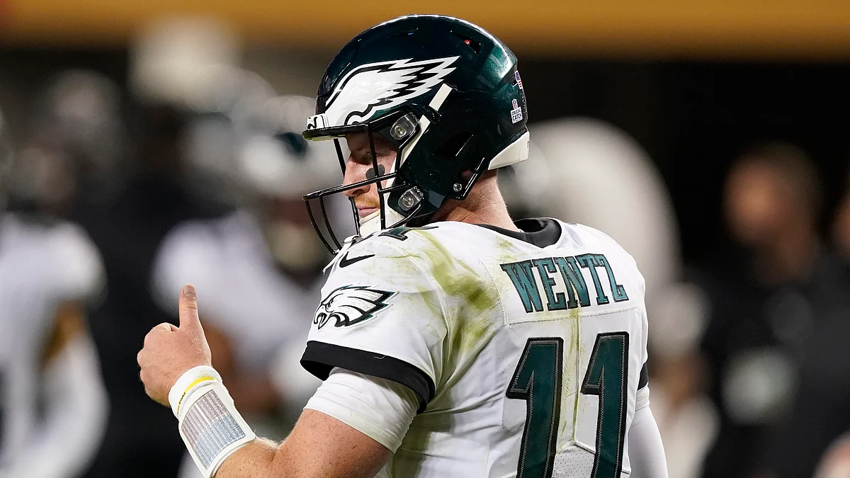 Carson Wentz rallies Eagles to 1st win of season, 25-20 over 49ers, to take first place in NFC East