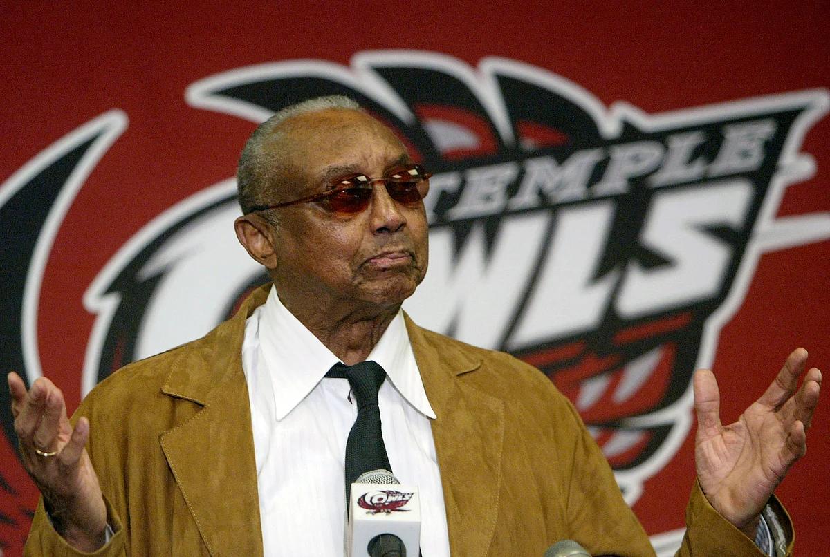FILE - Temple basketball coach John Chaney gestures while speaking about his retirement at a news conference in Philadelphia, in this Monday, March 13, 2006,
