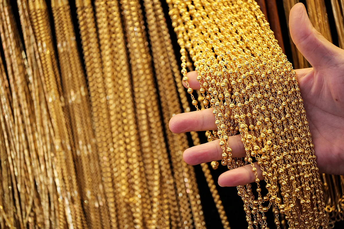 Ray Dalio, Paulson Keep Faith in Gold Amid Rate Hike Headwind
