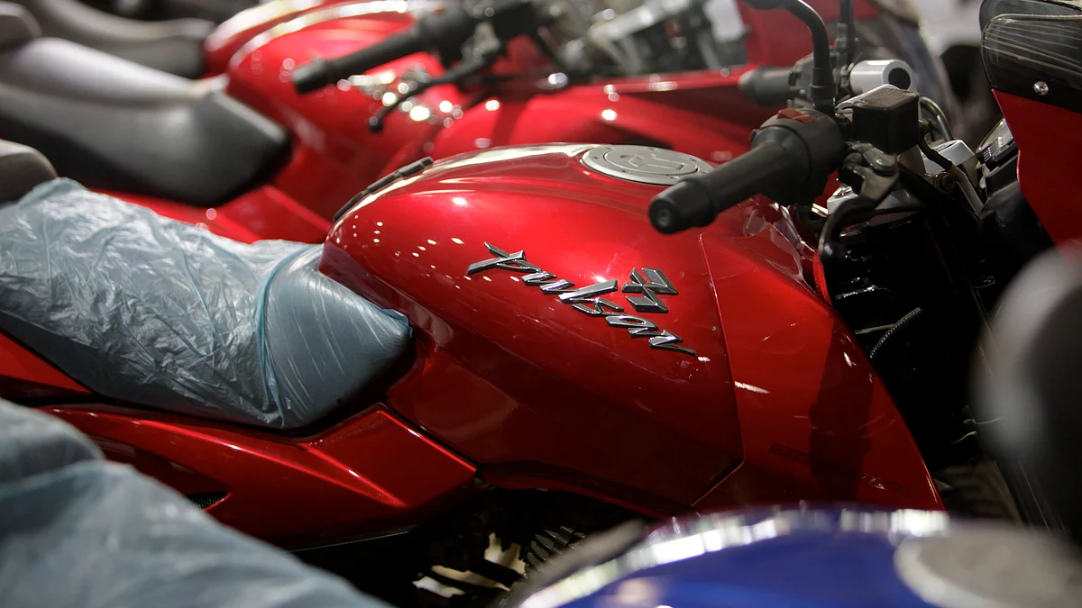 The Pulsar motorcycle, one of Bajaj Auto’s bestselling vehicles, parked outside a company showroom in Mumbai, India (Photographer: Adeel Halim/Bloomberg)