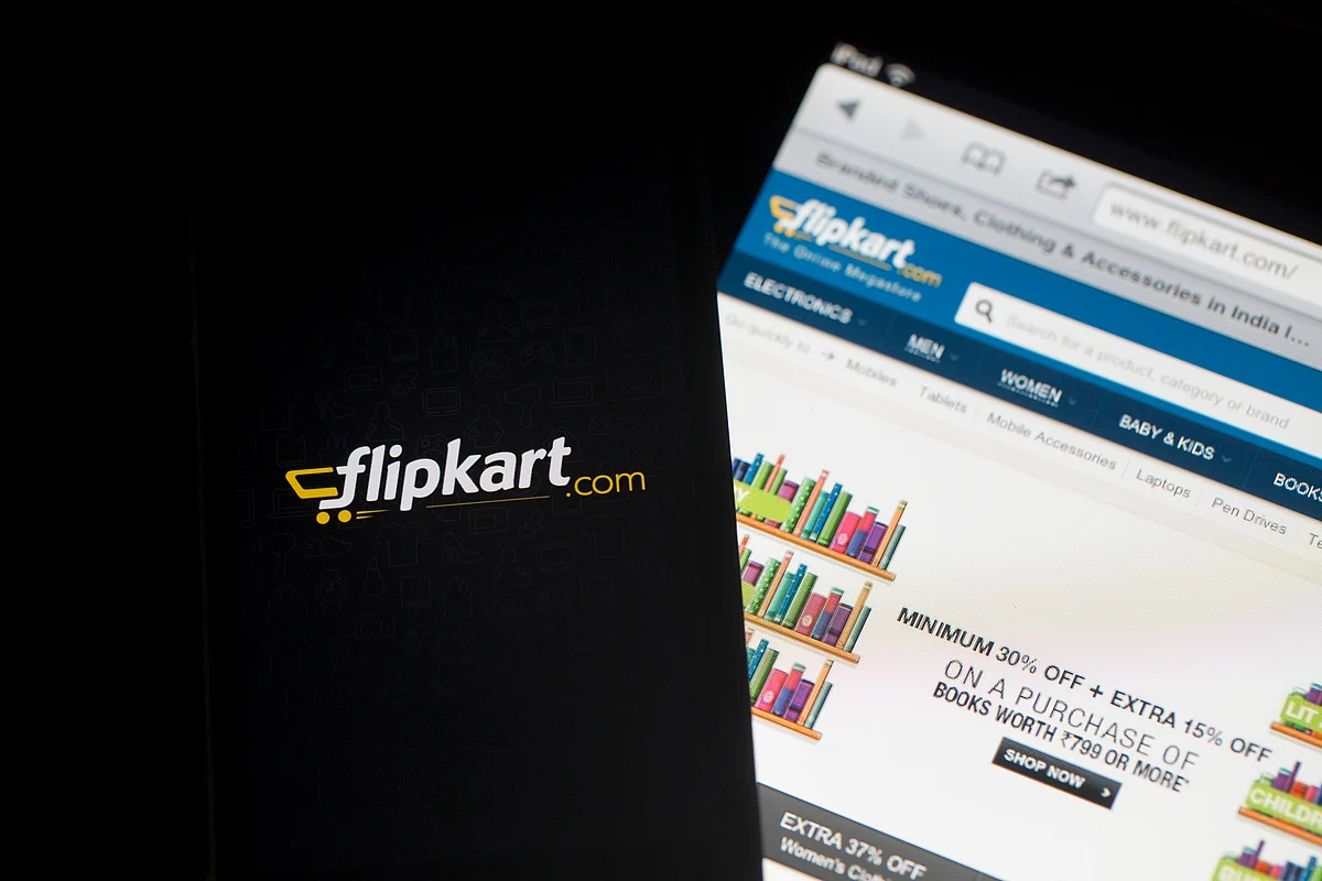 Flipkart’s application loading page, left, and website. (Photographer: Brent Lewin/Bloomberg)