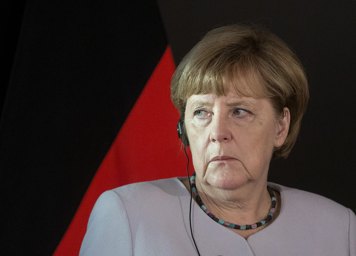 Merkel Raises Specter of Finance Crisis in Trade War Warning
