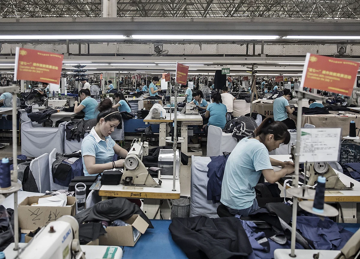 China Defends Developing Economy Status at WTO Amid Reform Push