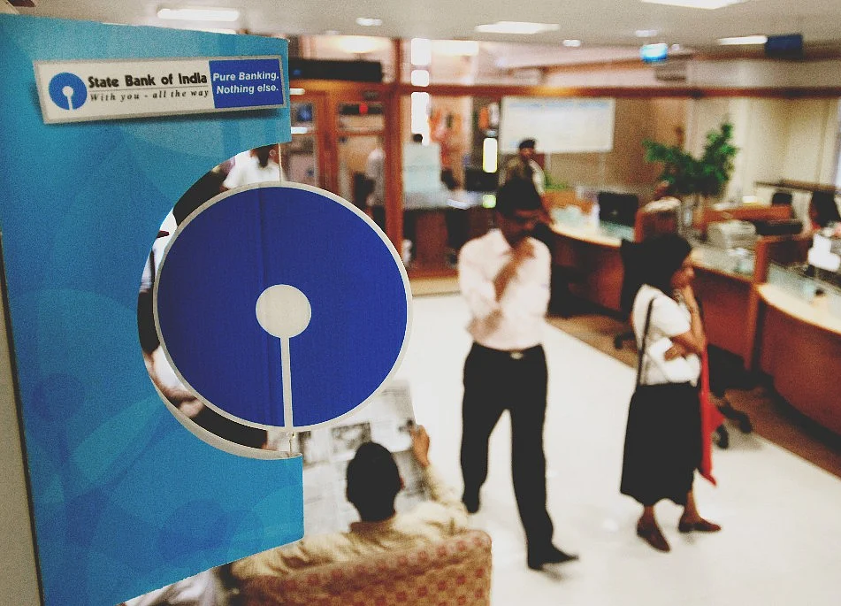 Record $1 Billion Loss Signals `Happy Year' for India's SBI