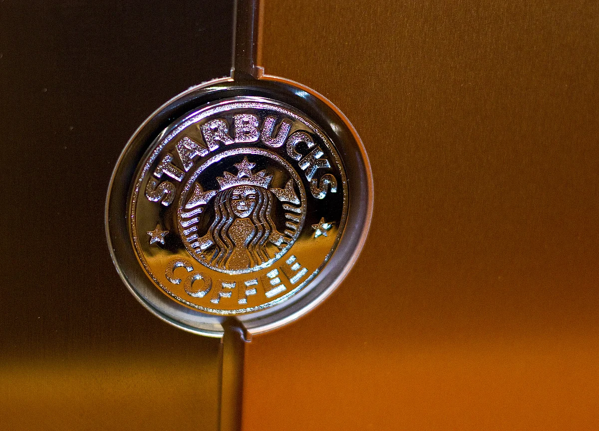 Starbucks Bets London Airport Can Crack the Reusable Cup Code