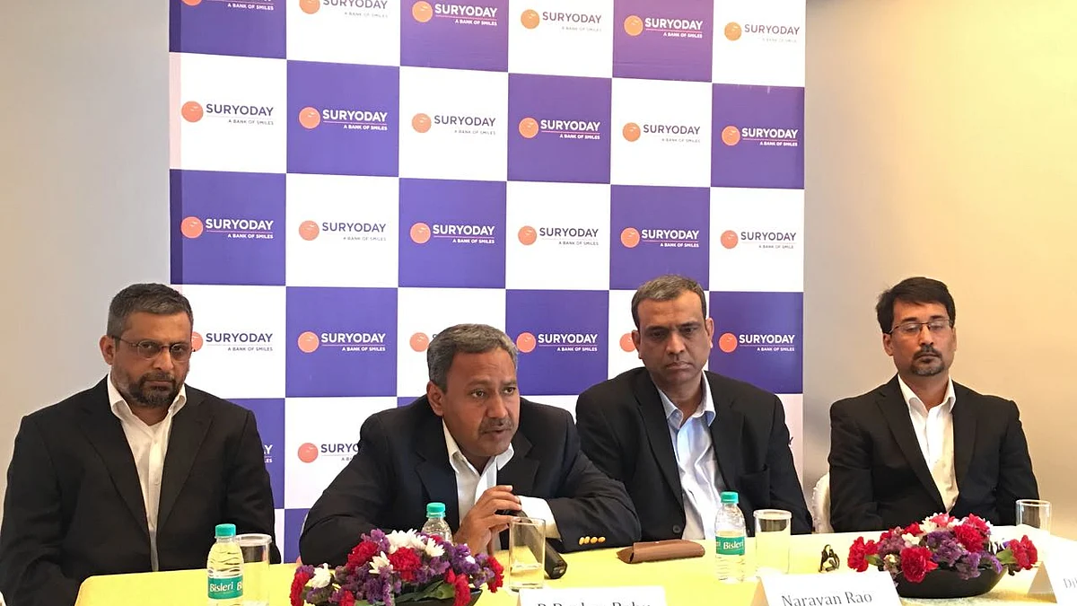 Suryoday Small Finance Bank’s management including MD & CEO R Baskar Babu (middle) attend the bank’s launch in Mumbai. (Photographer: Jyotiprakash Rout/BloombergQuint)