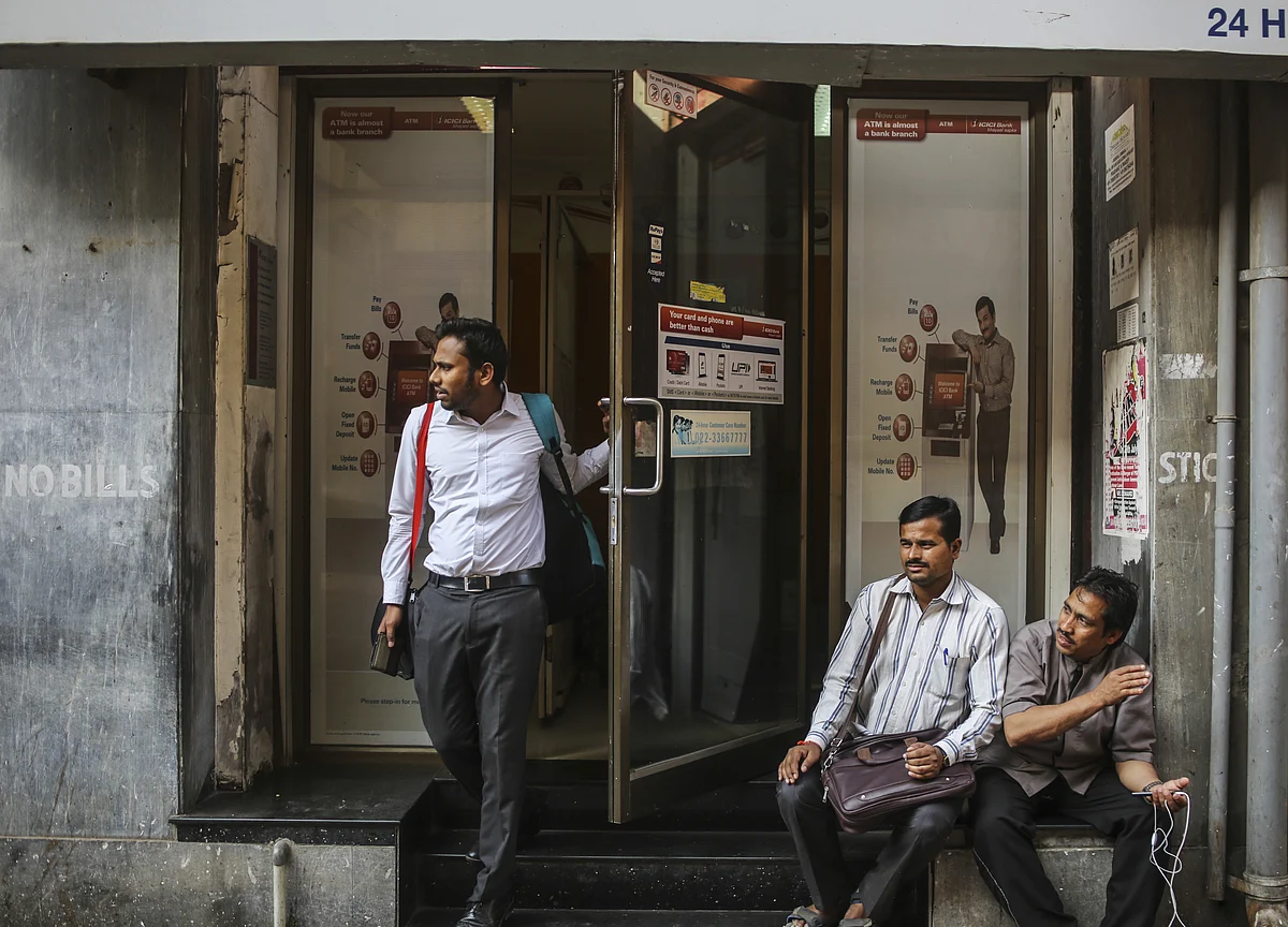 Fitch Downgrades ICICI Bank, Axis Bank Ratings Amid Banking Stress