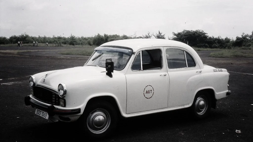 A Hindustan Ambassador parked in Goa India, October 1994 (Source: <a href="https://www.flickr.com/photos/andreboeni/">Andrew Bone</a>/ Flickr)
