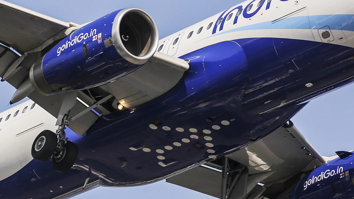 An aircraft operated by IndiGo, a unit of InterGlobe Aviation Ltd., prepares to land at Chhatrapati Shivaji International Airport in Mumbai. (Photographer: Dhiraj Singh/Bloomberg)