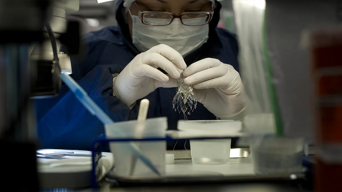 An employee works on the stent graft production line at the Medtronic Inc. assembly plant in Tijuana, Mexico. (Photographer: David Maung/Bloomberg)