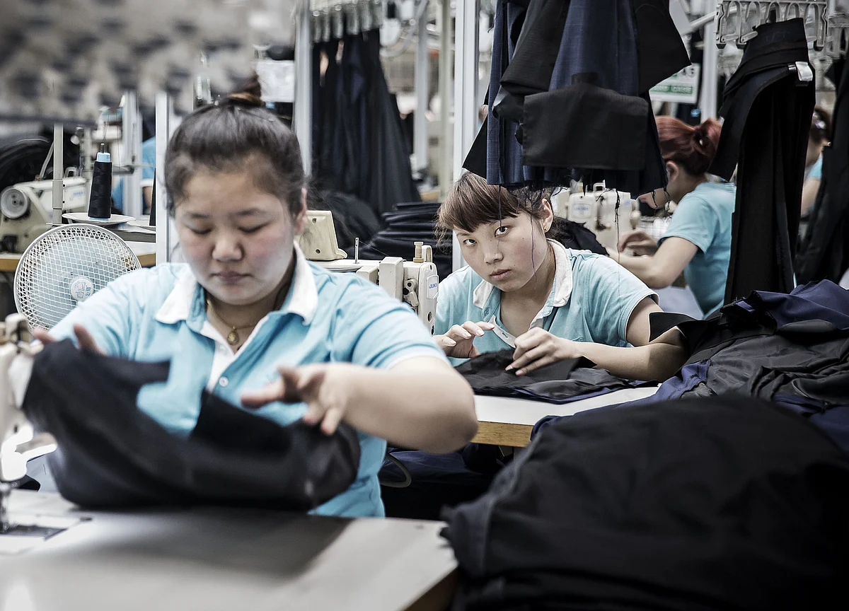China Factory Inflation Holds Up as Consumer Prices Gain