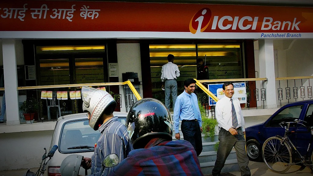 ICICI Bank’s gross non-performing assets ratio fell to 6.49 percent in June quarter from 6.7 percent in the March quarter. (Photographer: Amit Bhargava/Bloomberg News)