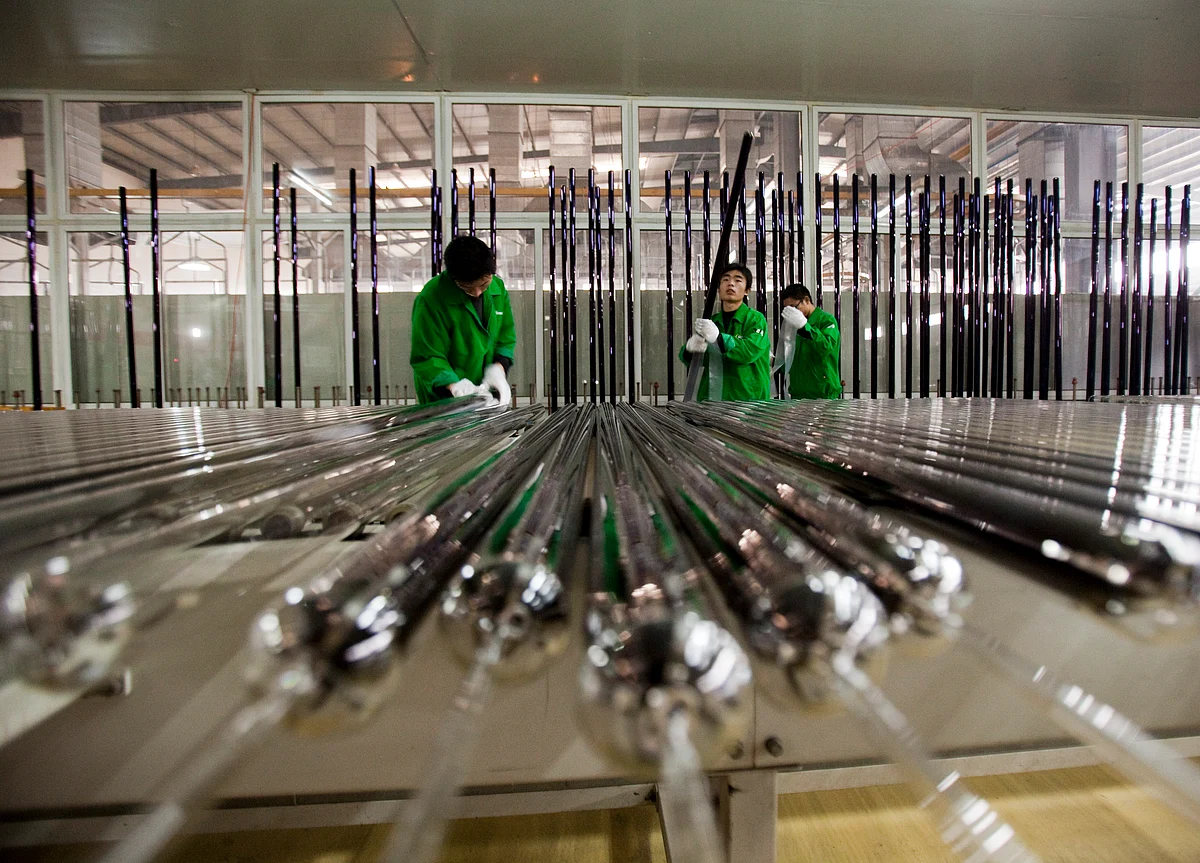 China Lowers Growth Target and Cuts Taxes as Economy Slows