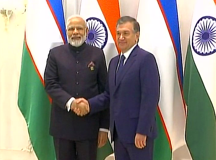 PM Modi with Uzbekistan President Shavkat Mirziyoyev. (Photo Courtesy: ANI Screenshot)