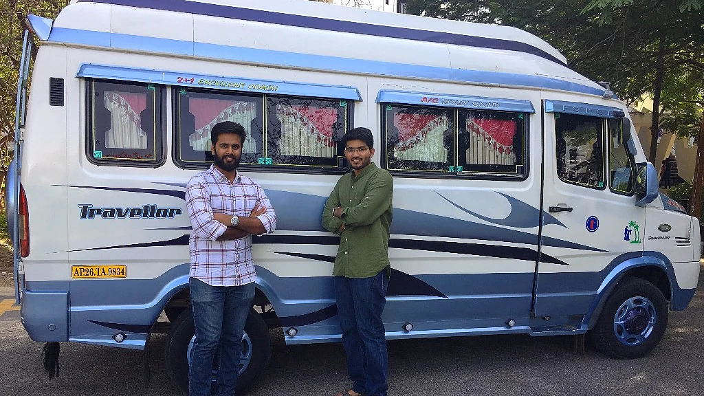 Prasanth & Hemanth, 2 of the 6 co-founders of Commut pose beside a Commut shuttle in Hyderabad (Photographer: Aayush Ailawadi/BloombergQuint)