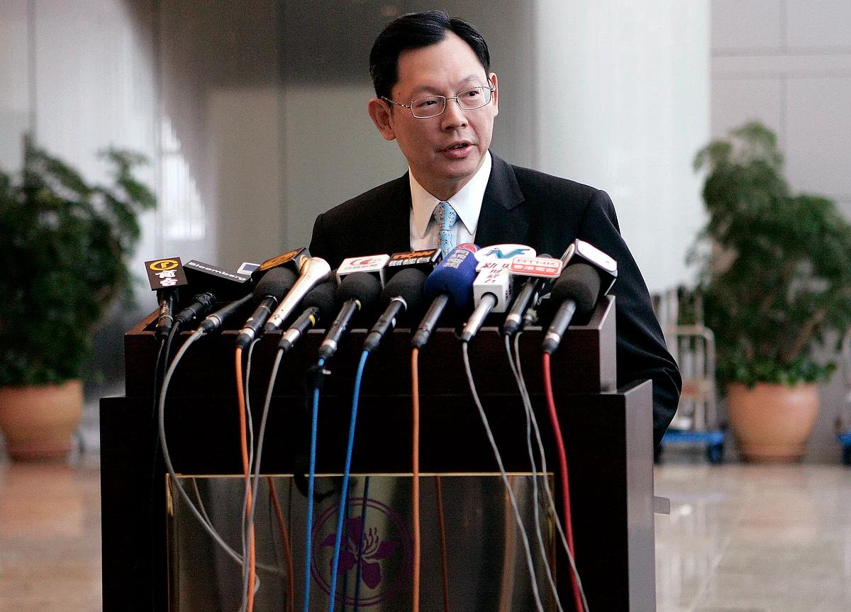 Hong Kong Cuts Base Rate After Fed; Banks Seen Staying on Hold