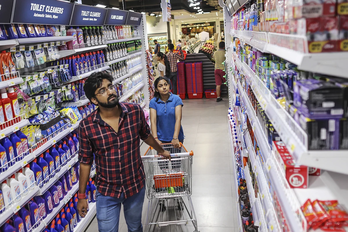 Shoppers browse household goods at a hypermarket. (Photographer: Dhiraj Singh/Bloomberg)