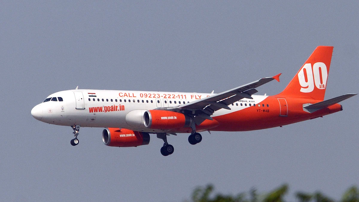 A Go Airlines (India) Ltd Airbus A320 aircraft comes in for a landing at Indira Gandhi International Airport in New Delhi. (Pankaj Nangia/Bloomberg)