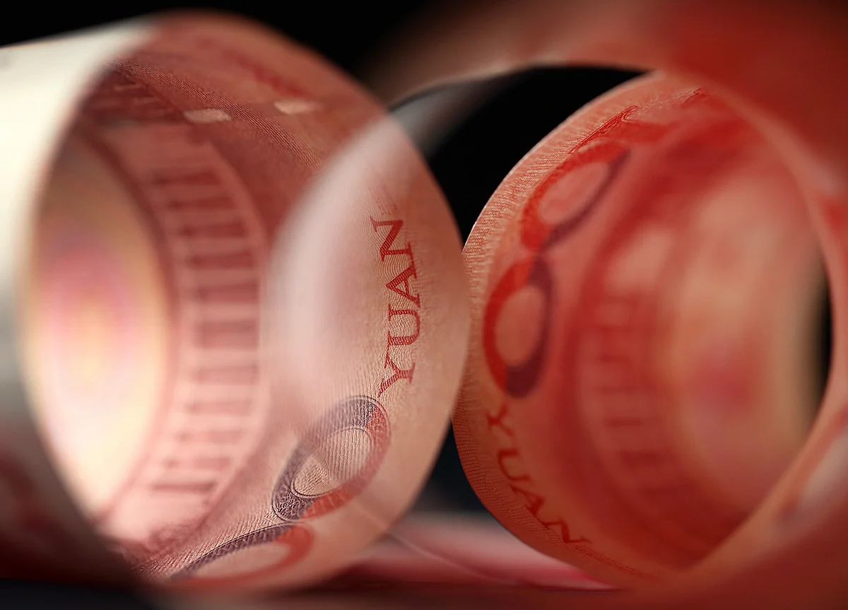 China Is Saving Stimulus for Trade War Winter as Yuan Weakens