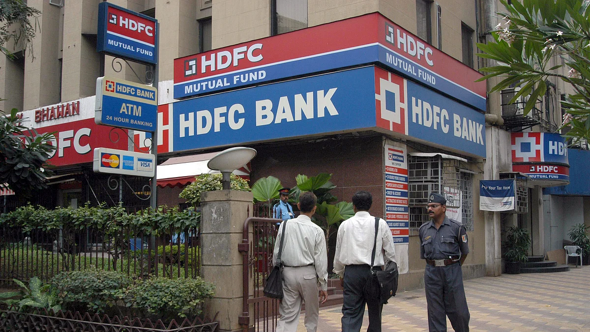 Customers enter a bank branch of the Housing Finance Development Corp. (HDFC) in Mumbai. (Photographer: Santosh Verma/Bloomberg News)
