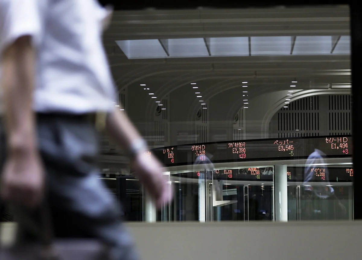 Stocks Rise to Record, Dollar Falls on Dovish Fed: Markets Wrap