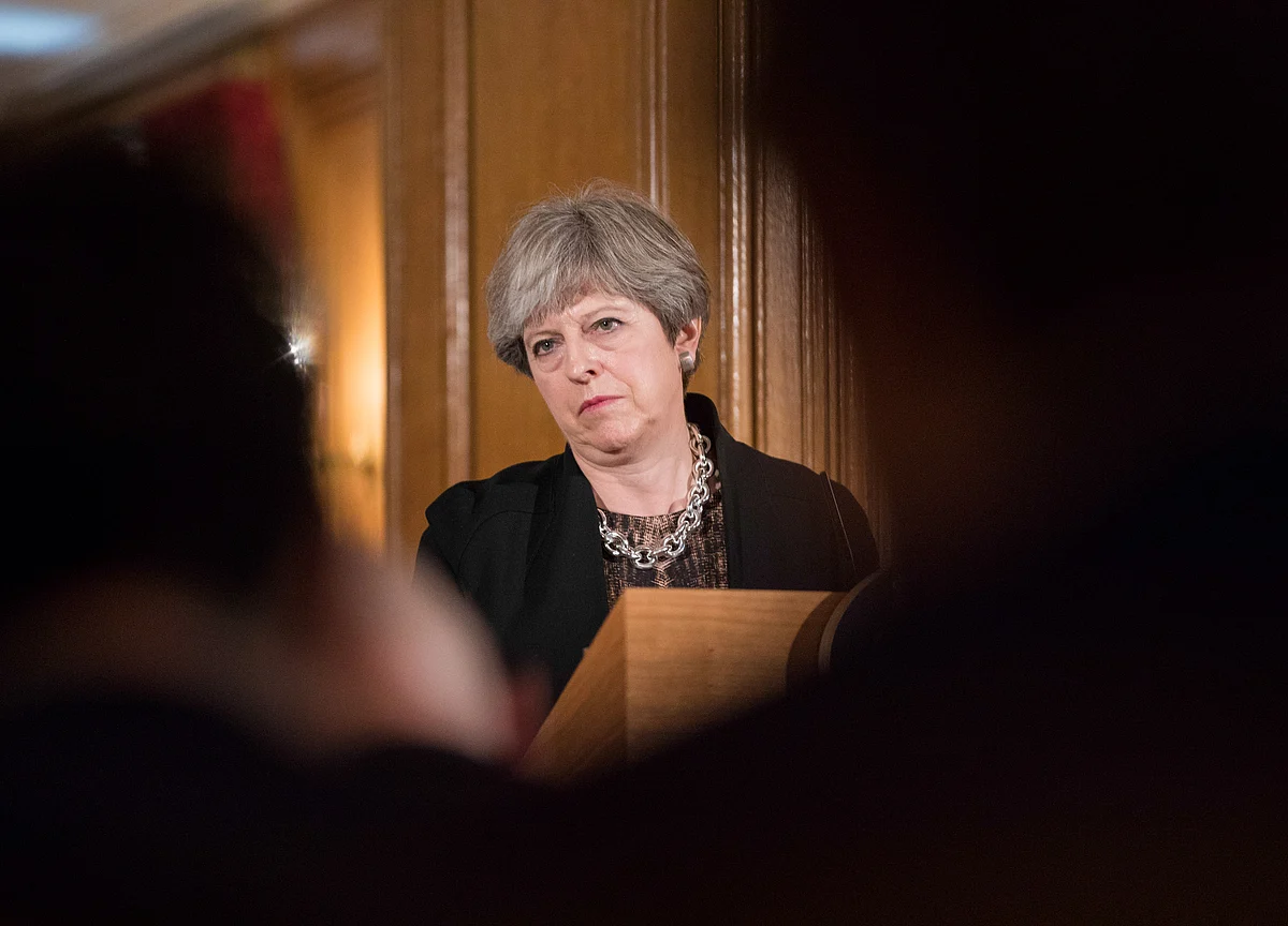 May Returns to Brussels After Brexit Defeat by Her Own Party
