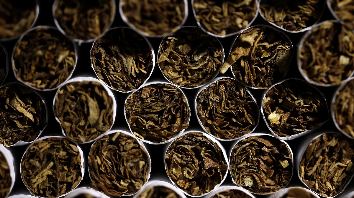 Tobacco cigarettes are arranged for a photograph. (Photographer: Kiyoshi Ota/Bloomberg)